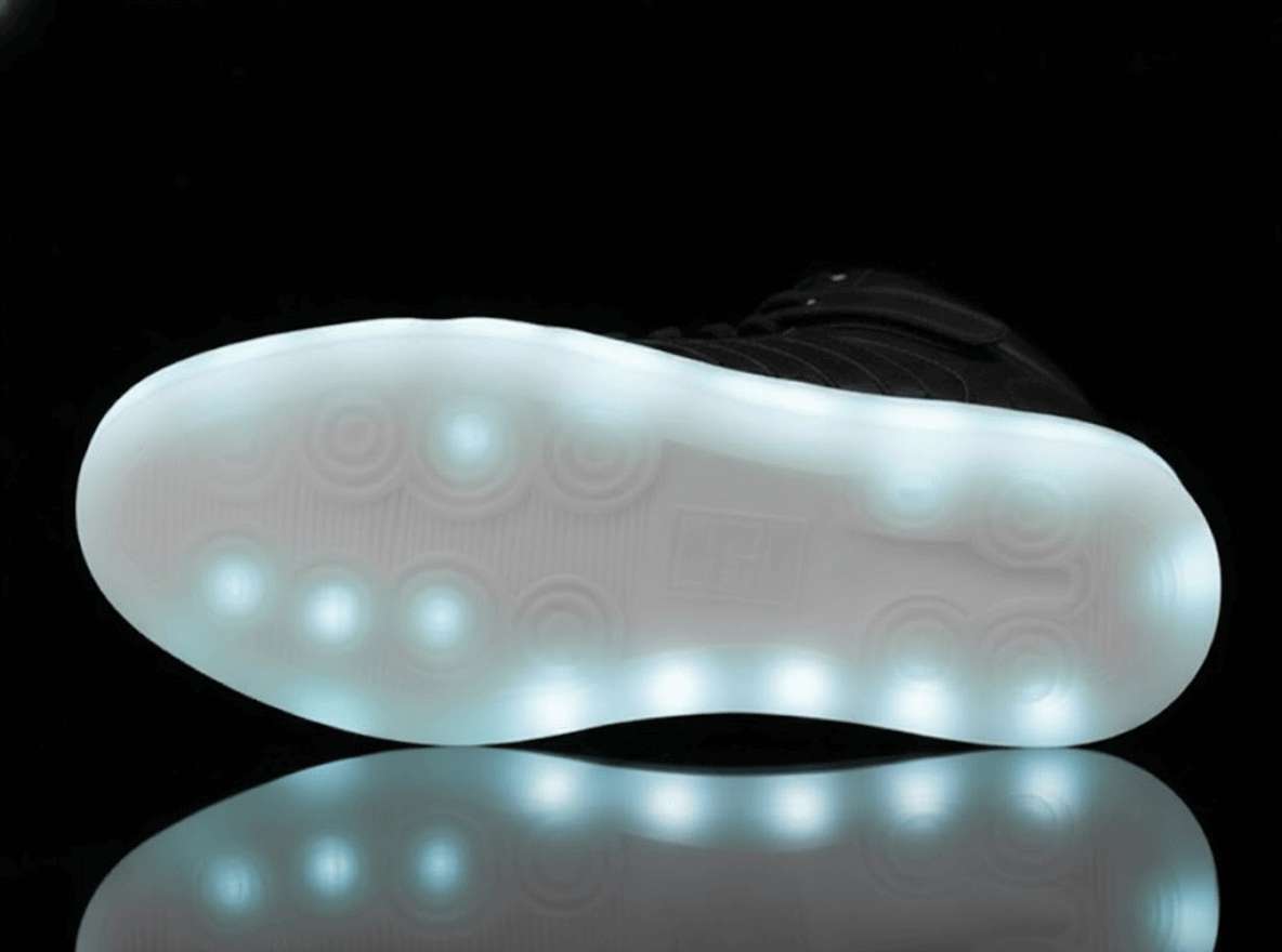 high top black led shoes striker bottom view